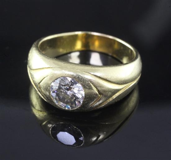 A gentlemens 18ct yellow gold and gypsy set solitaire diamond ring, size Q.
